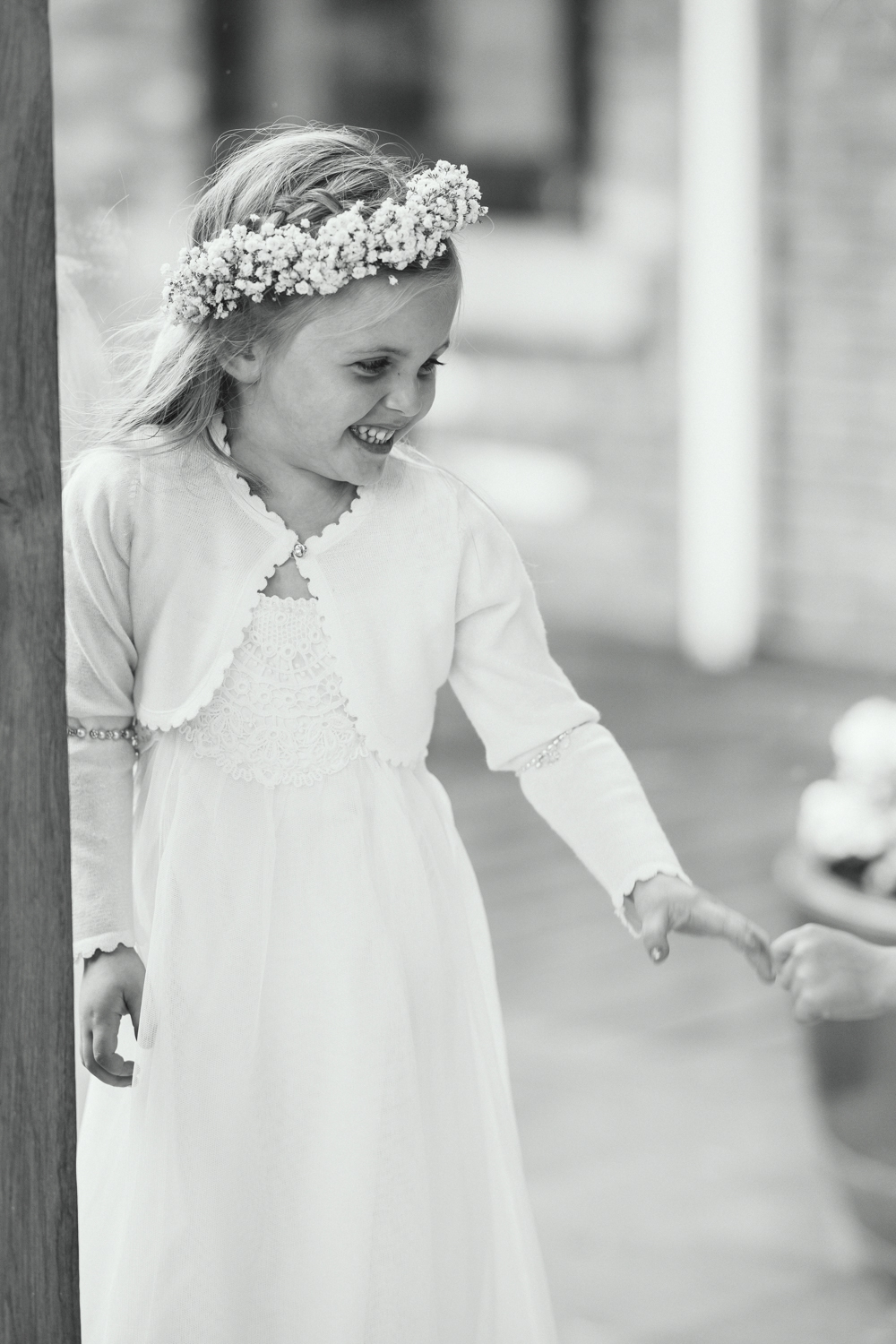 Black and white photo of a flowergirl