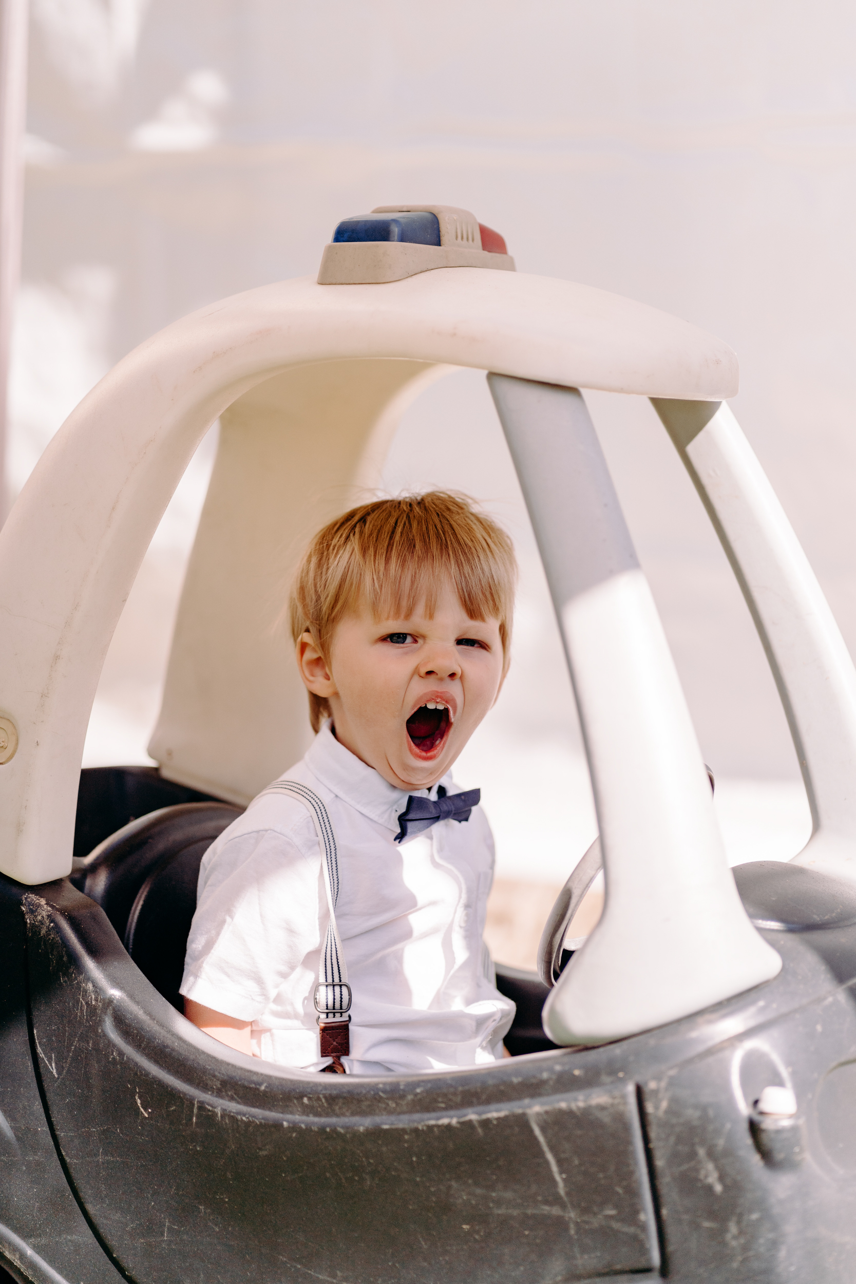 Funny photo of little boy yawning