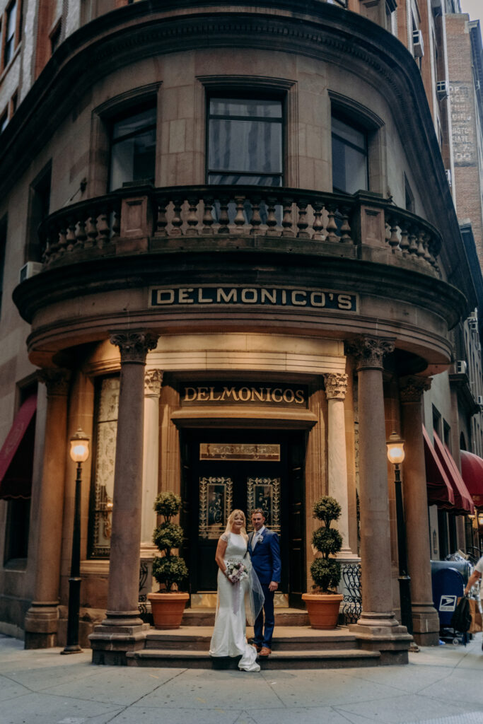 Bride and groom outside Delmonicos
