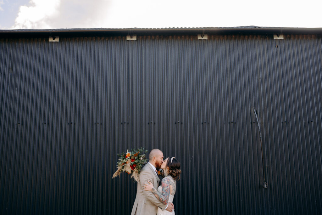 natural wedding portraits of bride and groom at donington park farmhouse