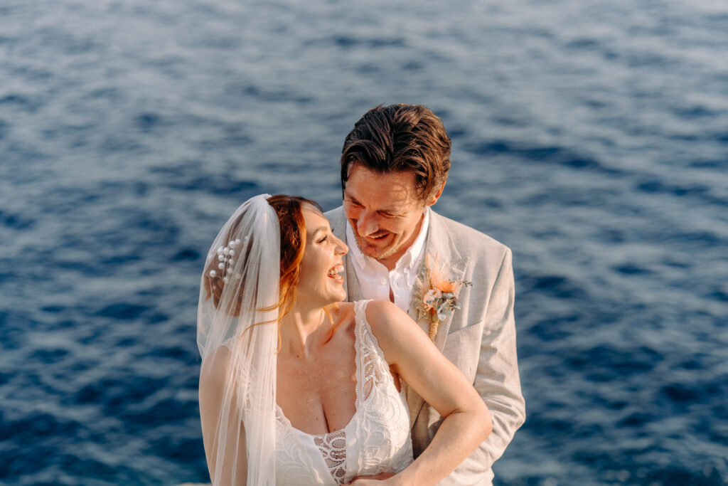 bride and groom by the sea at hotel croatia wedding, dubrovnik
