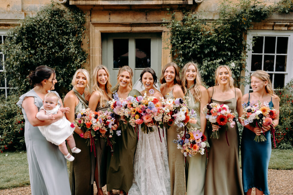 bride and bridesmaids with colourful, home grown wedding bouquets made by lincolnshire flower company