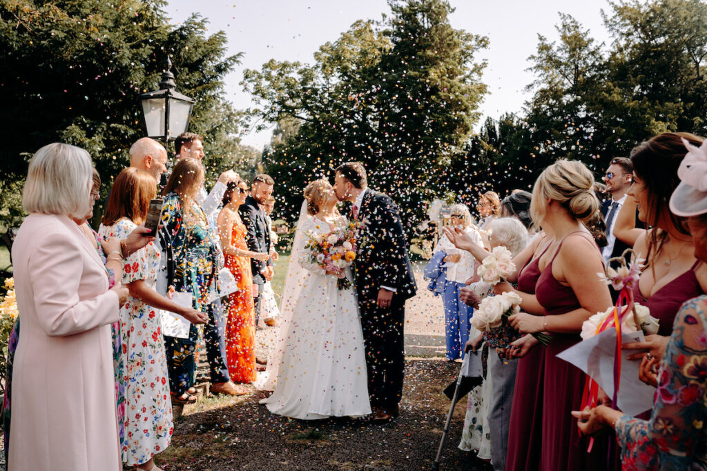 north wales church wedding ceremony with amazing paper confetti