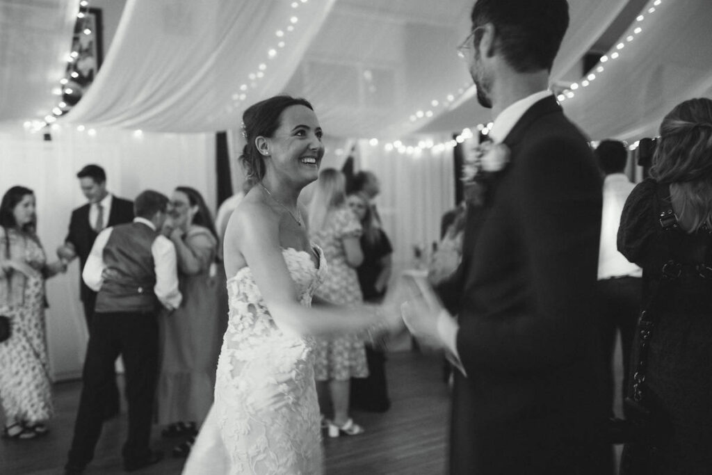 fun dance floor photography at village hall wedding in derbyshire