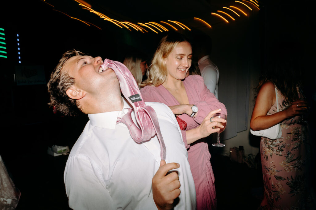 fun dance floor photography at village hall wedding in derbyshire