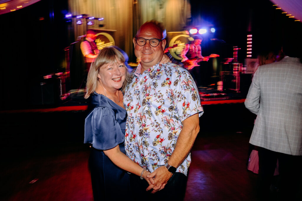 fun dance floor photography at village hall wedding in derbyshire