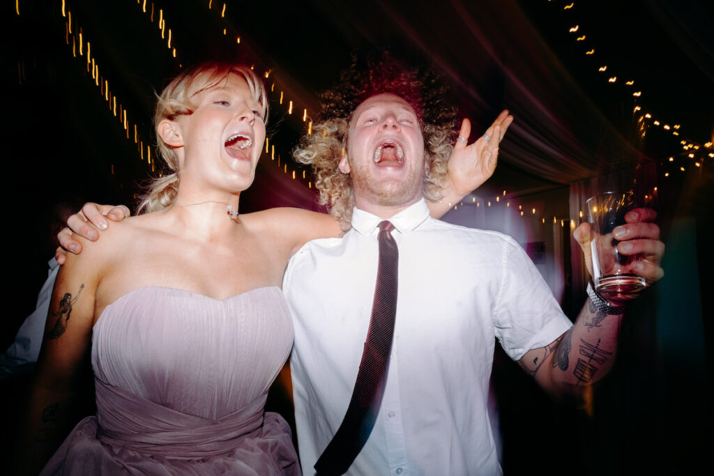 fun dance floor photography at village hall wedding in derbyshire