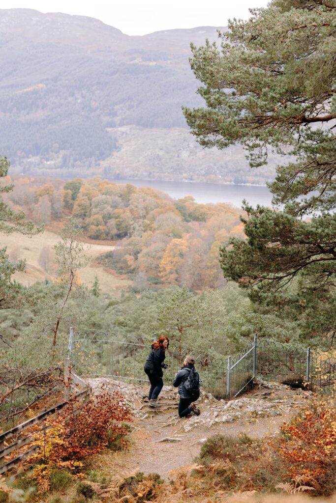 surprise proposal photography in the woodland above loch ness in the scottish highlands