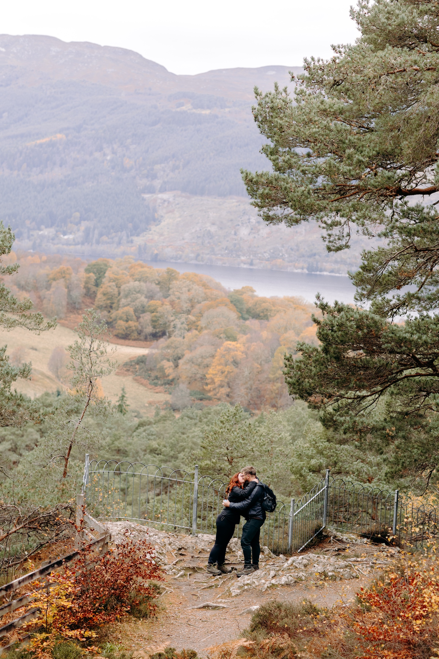surprise proposal photography in the woodland above loch ness in the scottish highlands