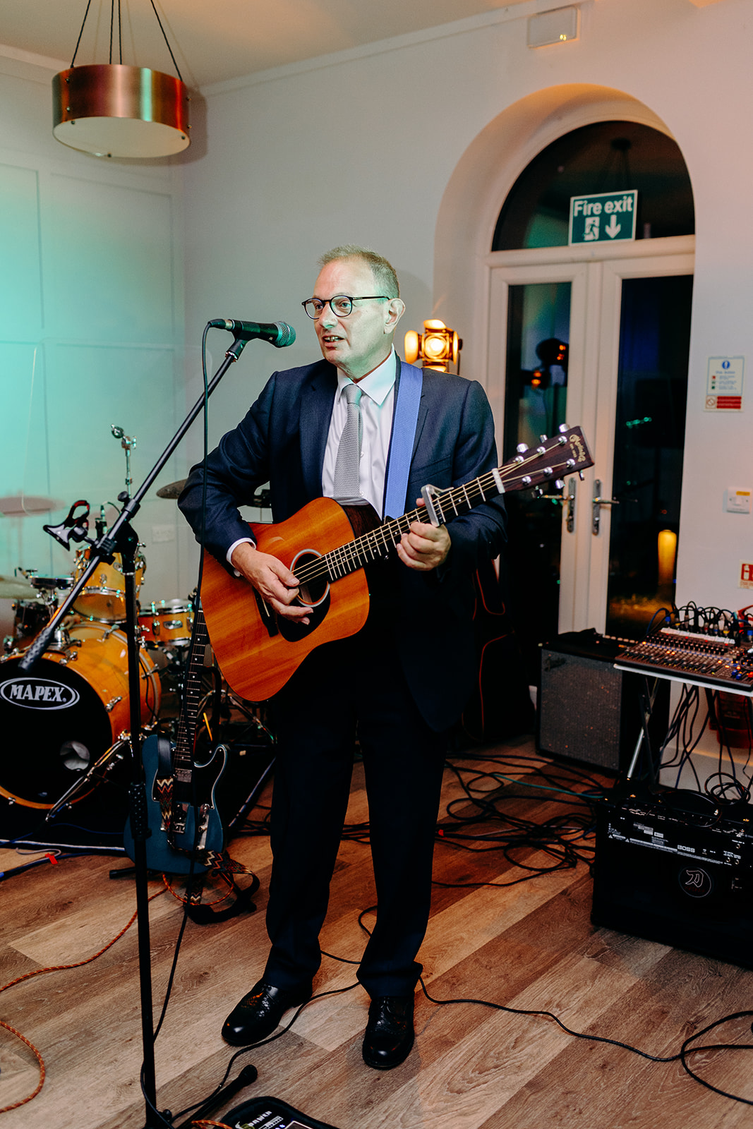 Father of the bride performing during a fun evening reception at the Derbyshire wedding.