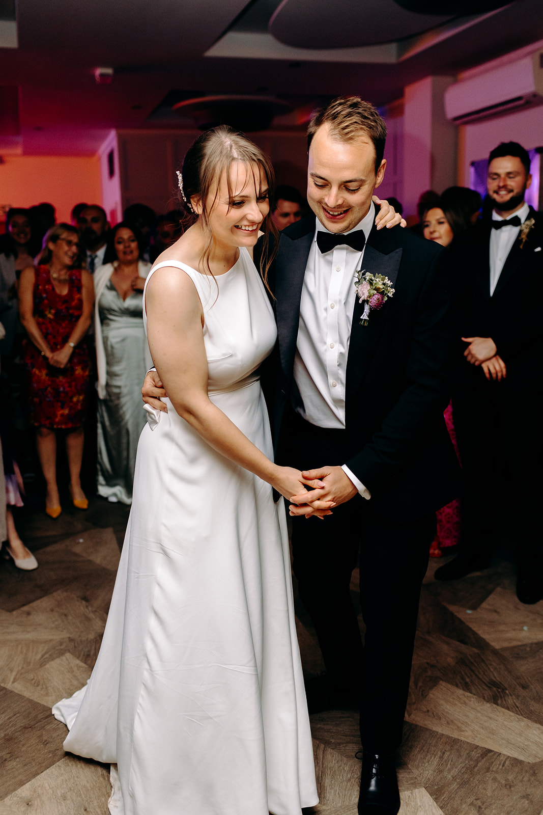 Bride and groom share their first dance inside the wedding reception space at Darwin Lakes.