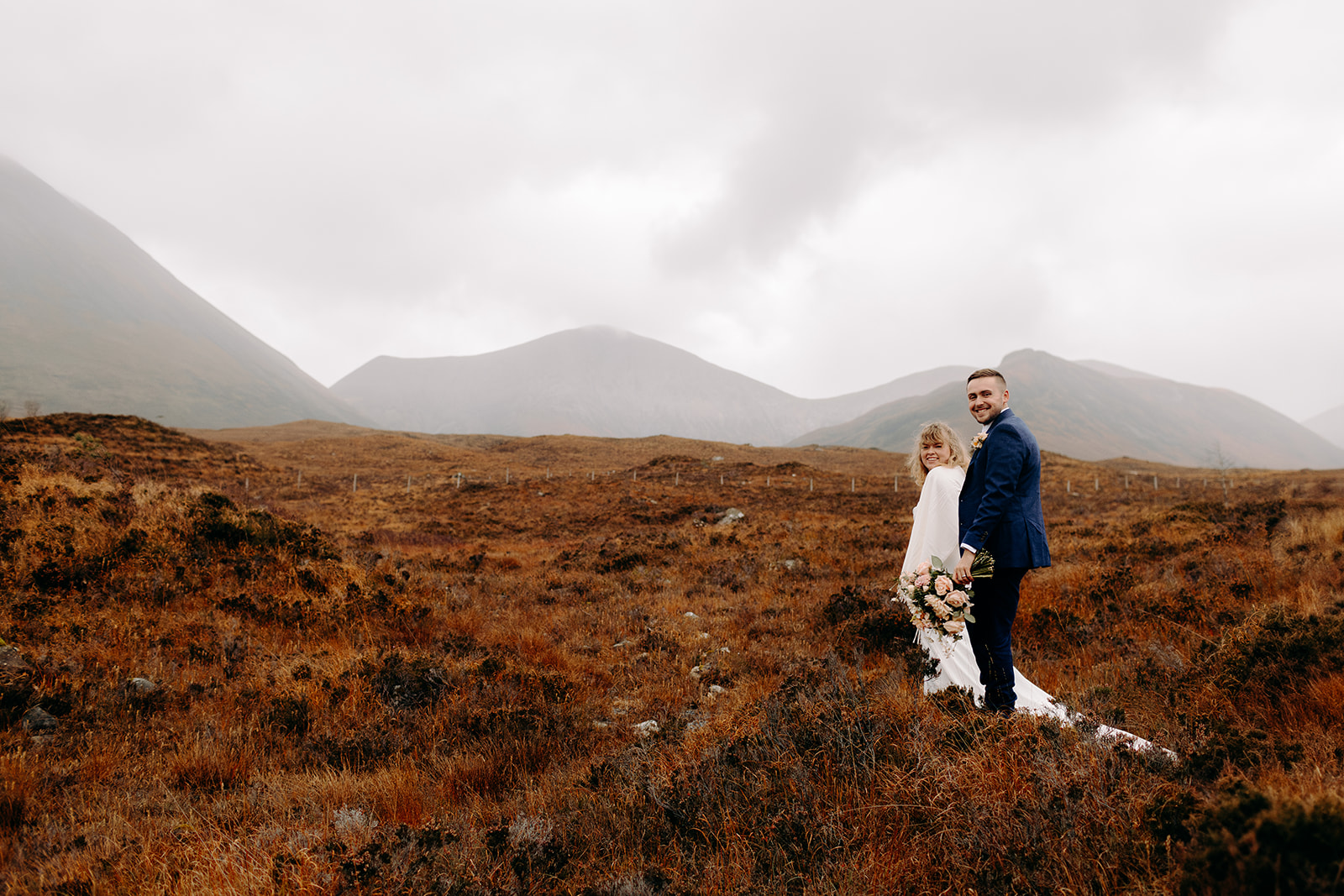 Beautiful backdrop of the Scottish Cairngorms, during an American couple's elopement