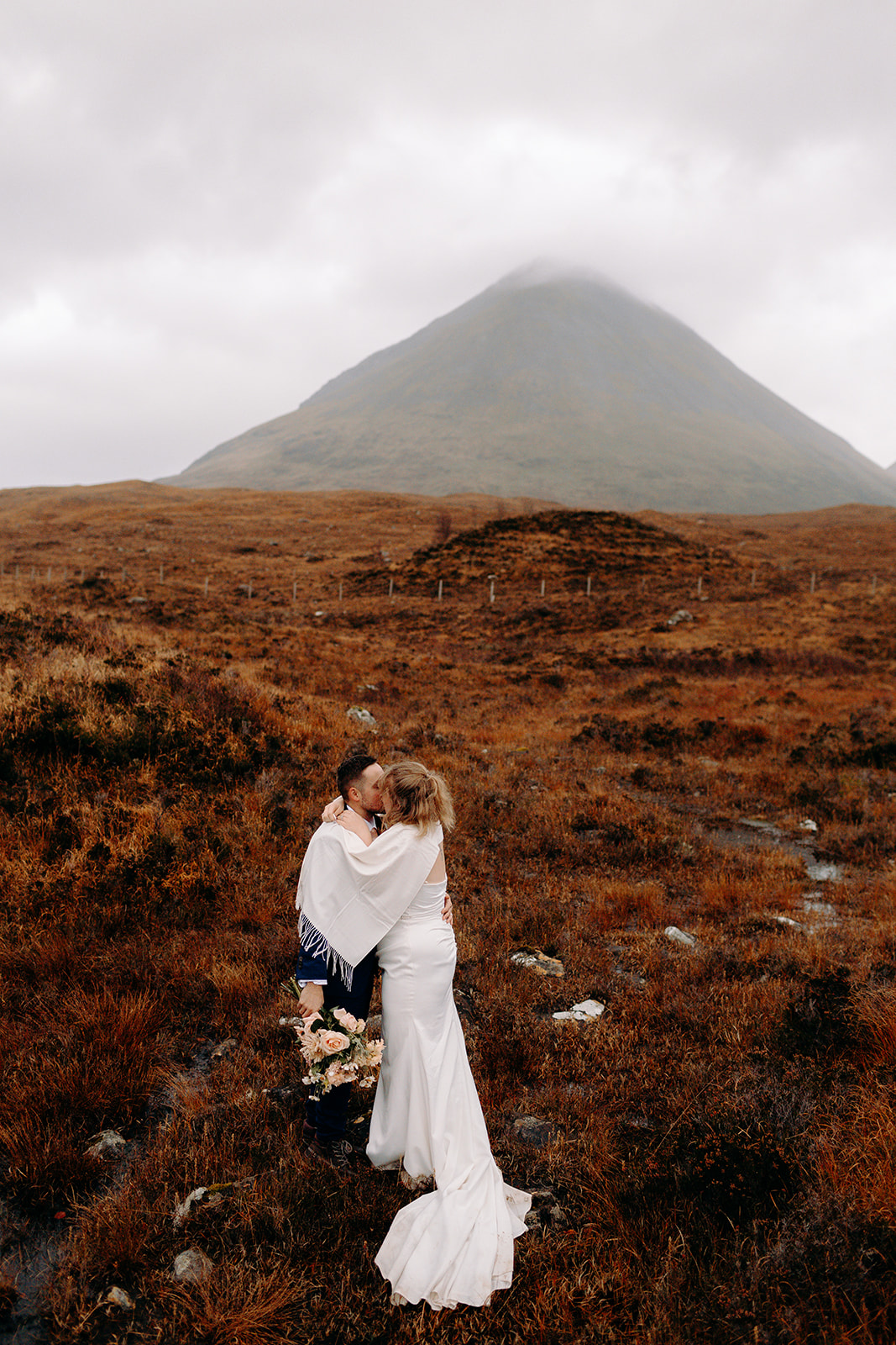 Dramatic Scottish mountains and a beautiful couple who eloped to The Fairy Pools on Skye