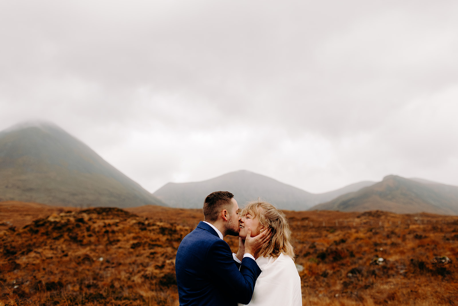 Couple dancing across the golden Skye landscape after saying ‘I do’ — the Scottish Highlands were showing off!
