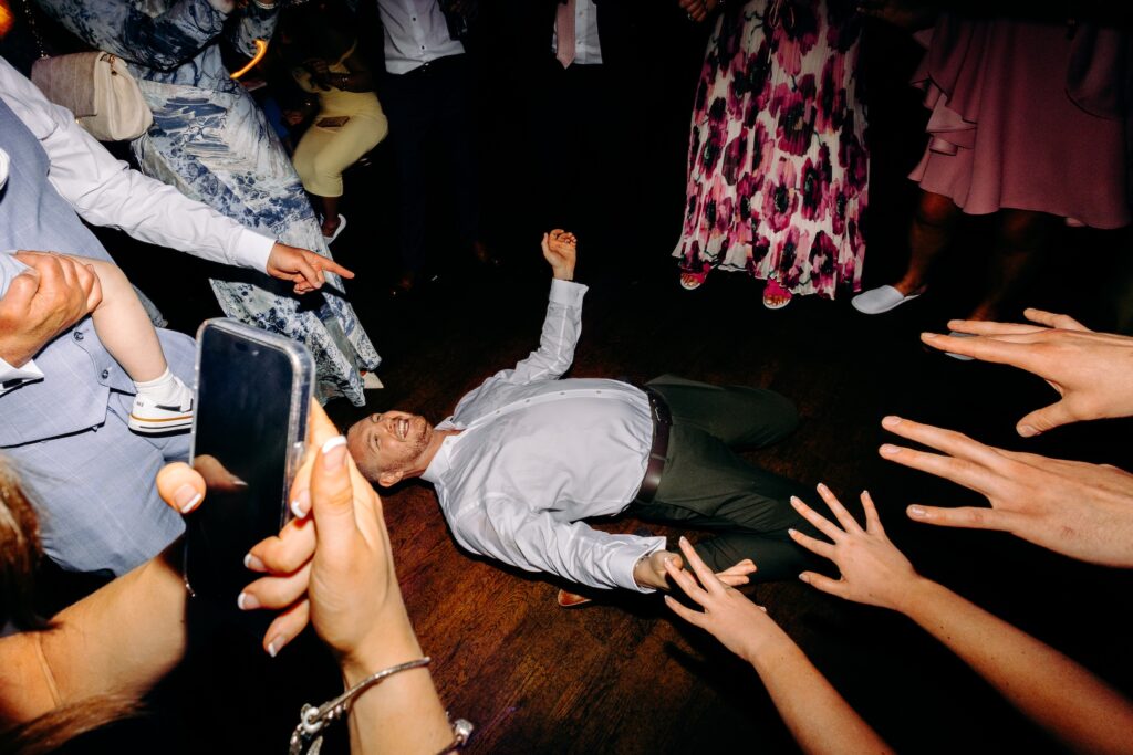 Fun dancefloor photography at a West Mill Wedding