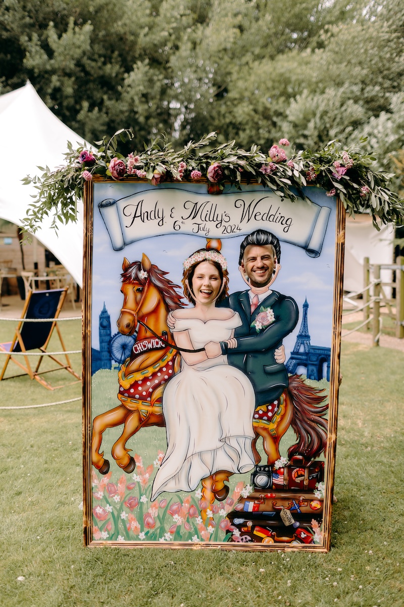 Natural photo of bride and groom in vintage style sign at Marleybrook House
