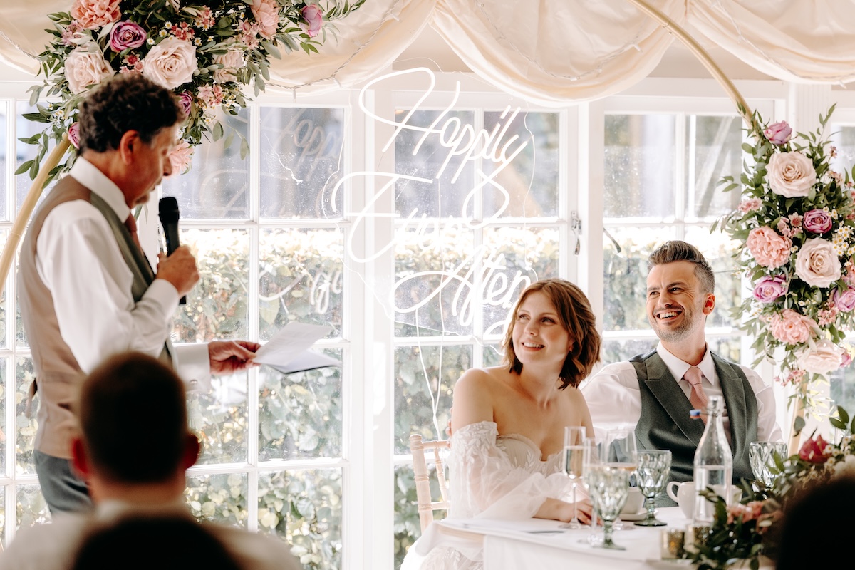Natural photography of the speeches at a summer wedding at Marleybrook House