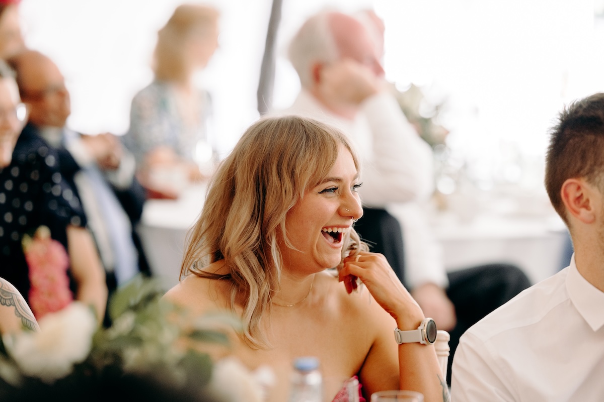 Natural photography of the speeches at a summer wedding at Marleybrook House