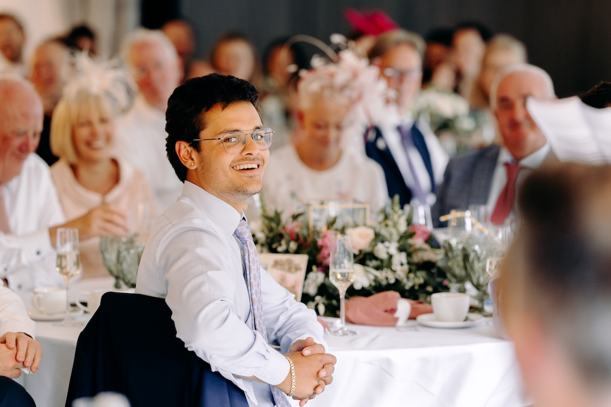 Natural photography of the speeches at a summer wedding at Marleybrook House