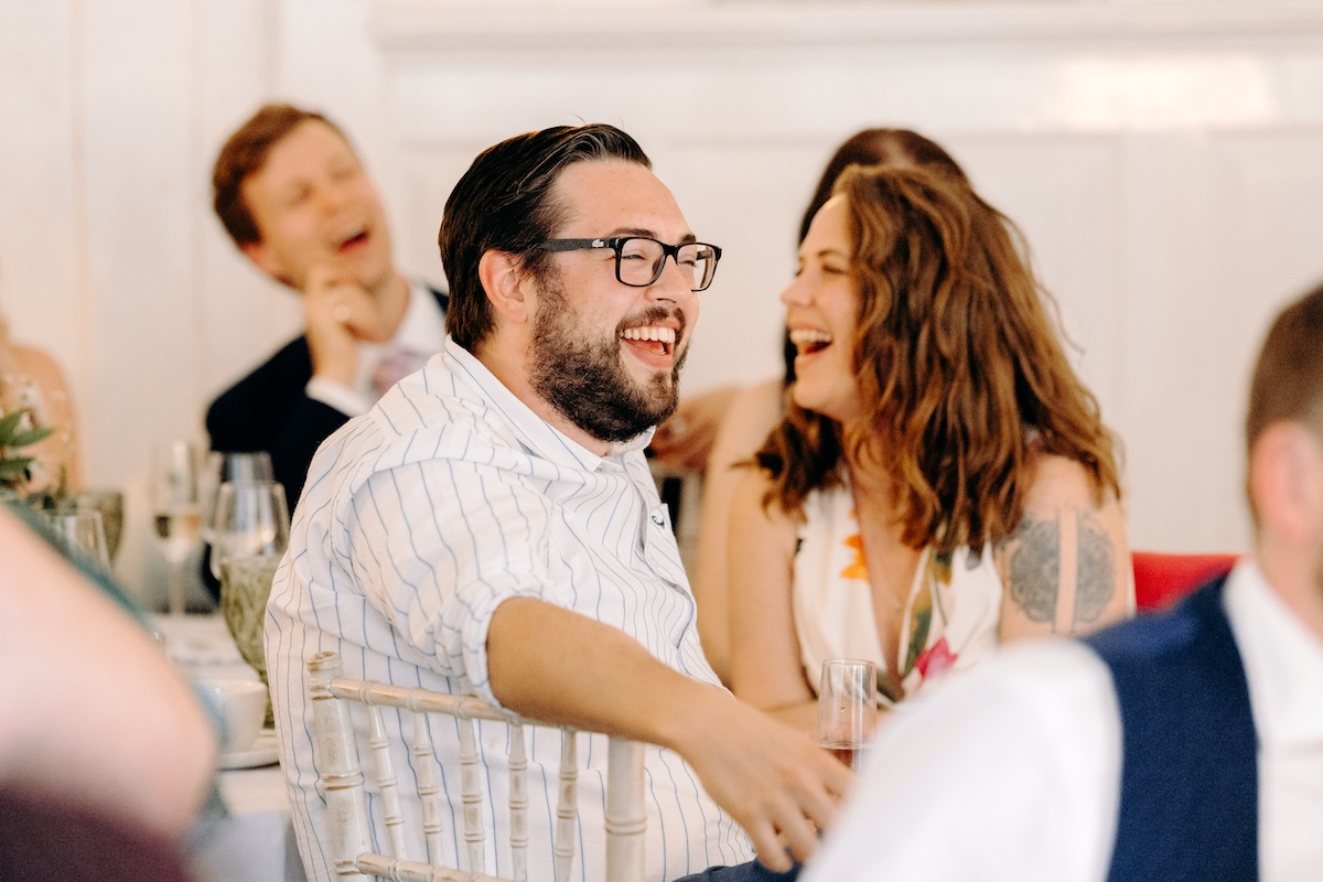 Natural photography of the speeches at a summer wedding at Marleybrook House
