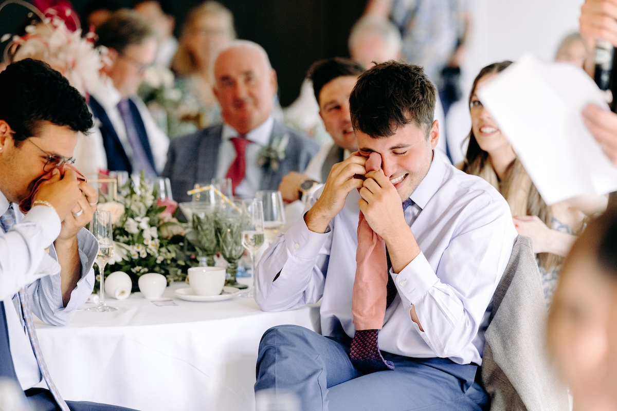 Natural photography of the speeches at a summer wedding at Marleybrook House