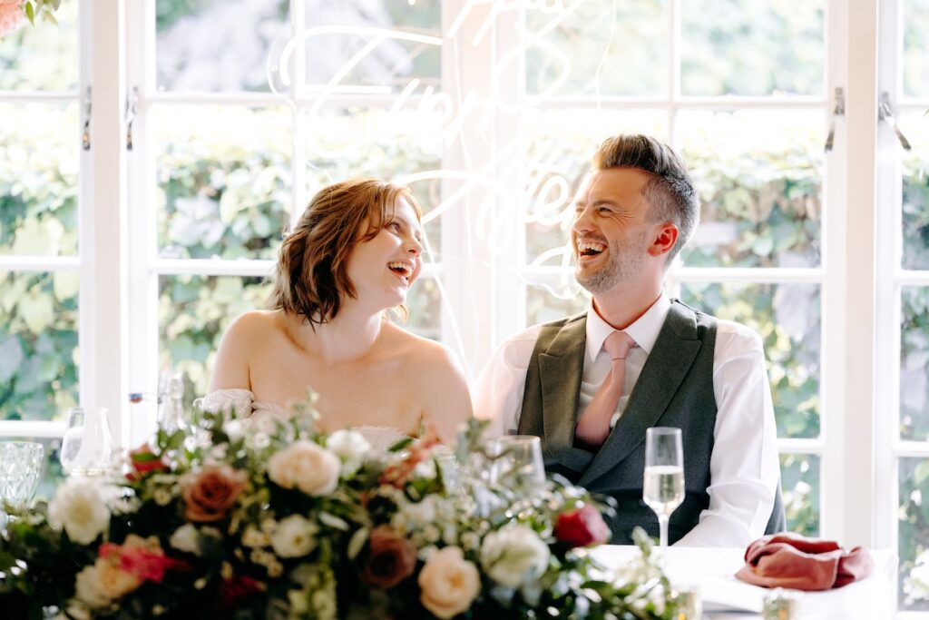 Natural photography of the speeches at a summer wedding at Marleybrook House