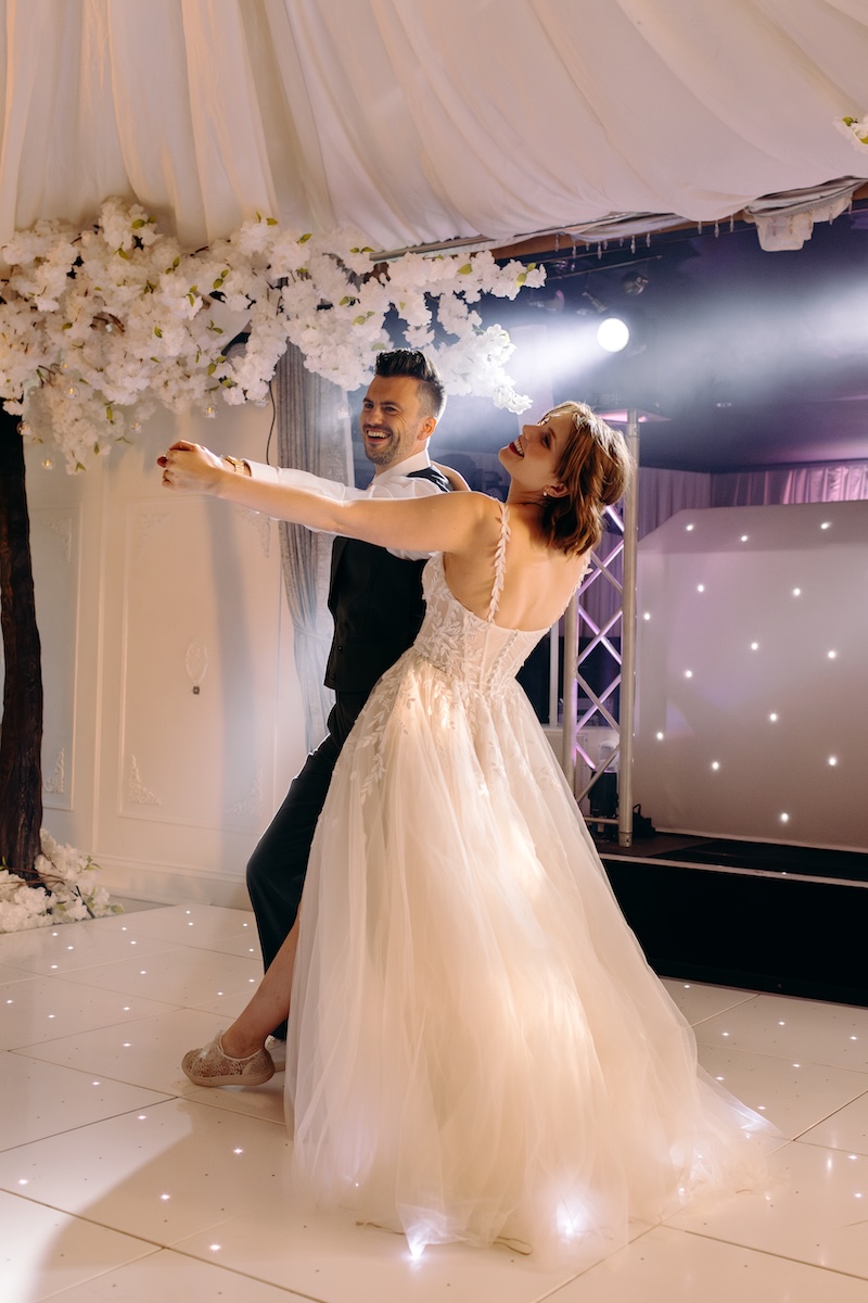 Couple having their first dance in the marquee at Marleybrook House