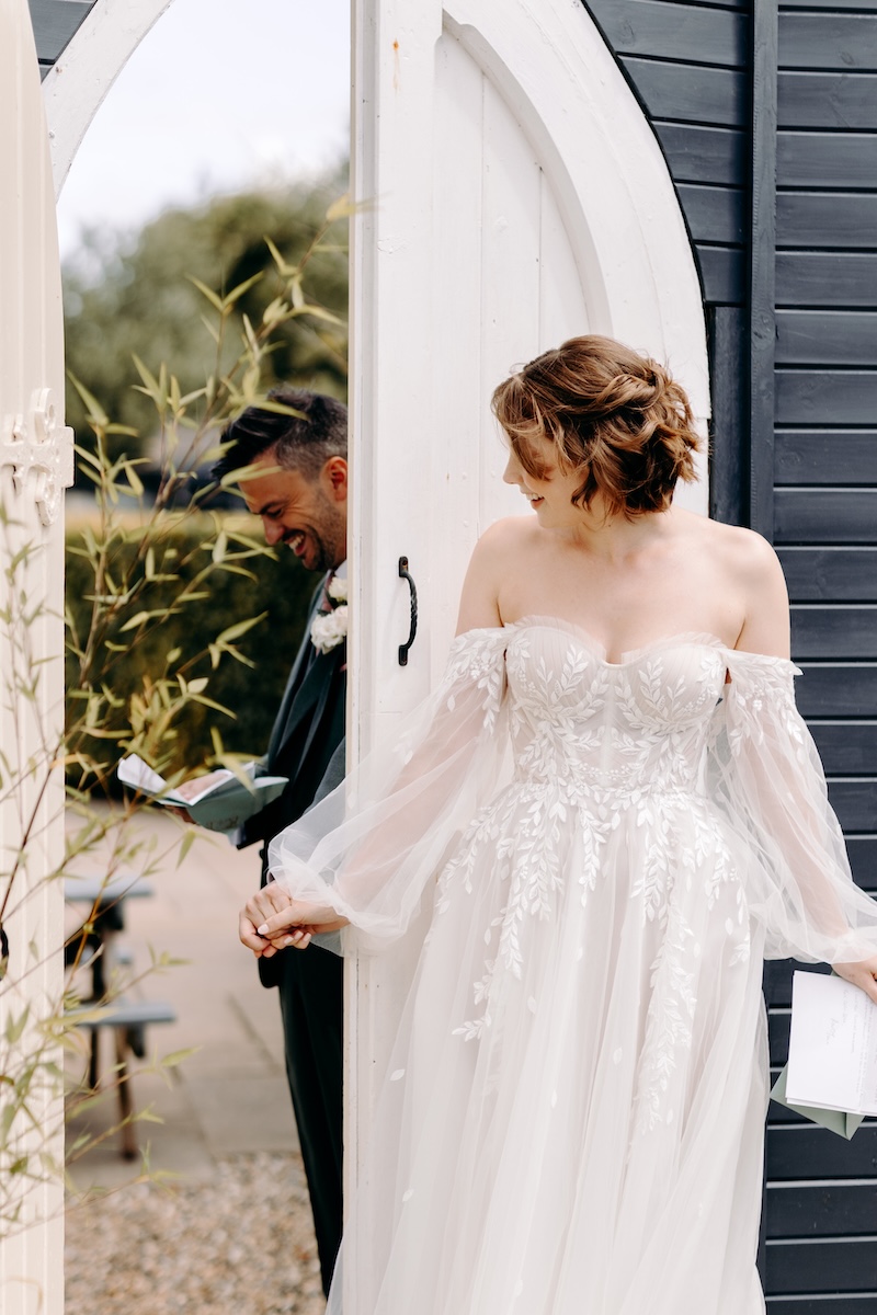 Bride smiling with anticipation before the ceremony – beautiful bridal portrait captured at Marleybrook House.