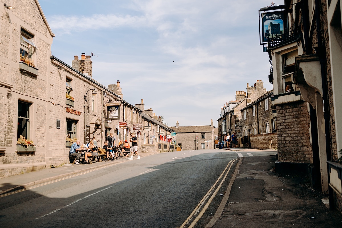 Quiet Castleton streets the couple walked through on their way to their Peak District elopement ceremony.