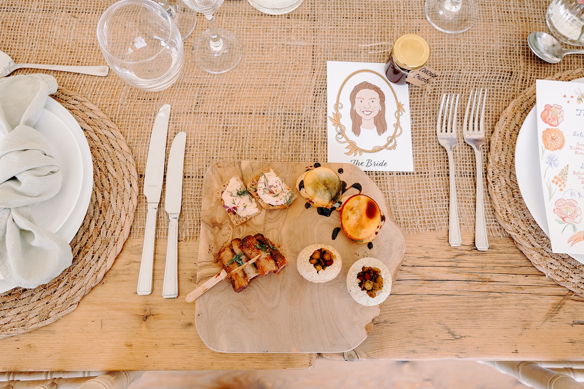 Wedding canapes inside light-filled marquee at Eyam Hall in the Peak District.