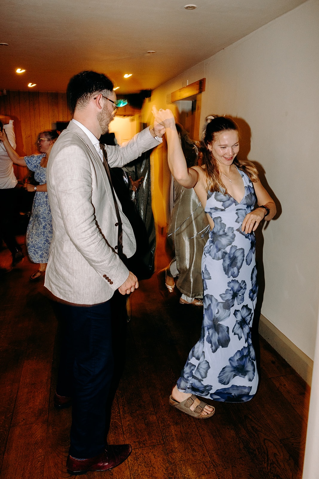 Lively ceilidh dancing with guests spinning and laughing on the dance floor at Ashes Barns.