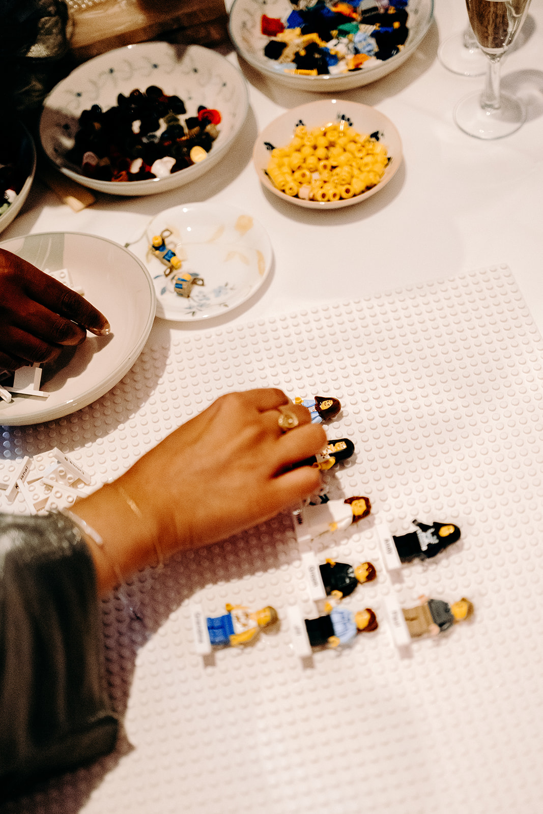 Wedding guests making themselves as lego characters - an alternative wedding guest book idea.