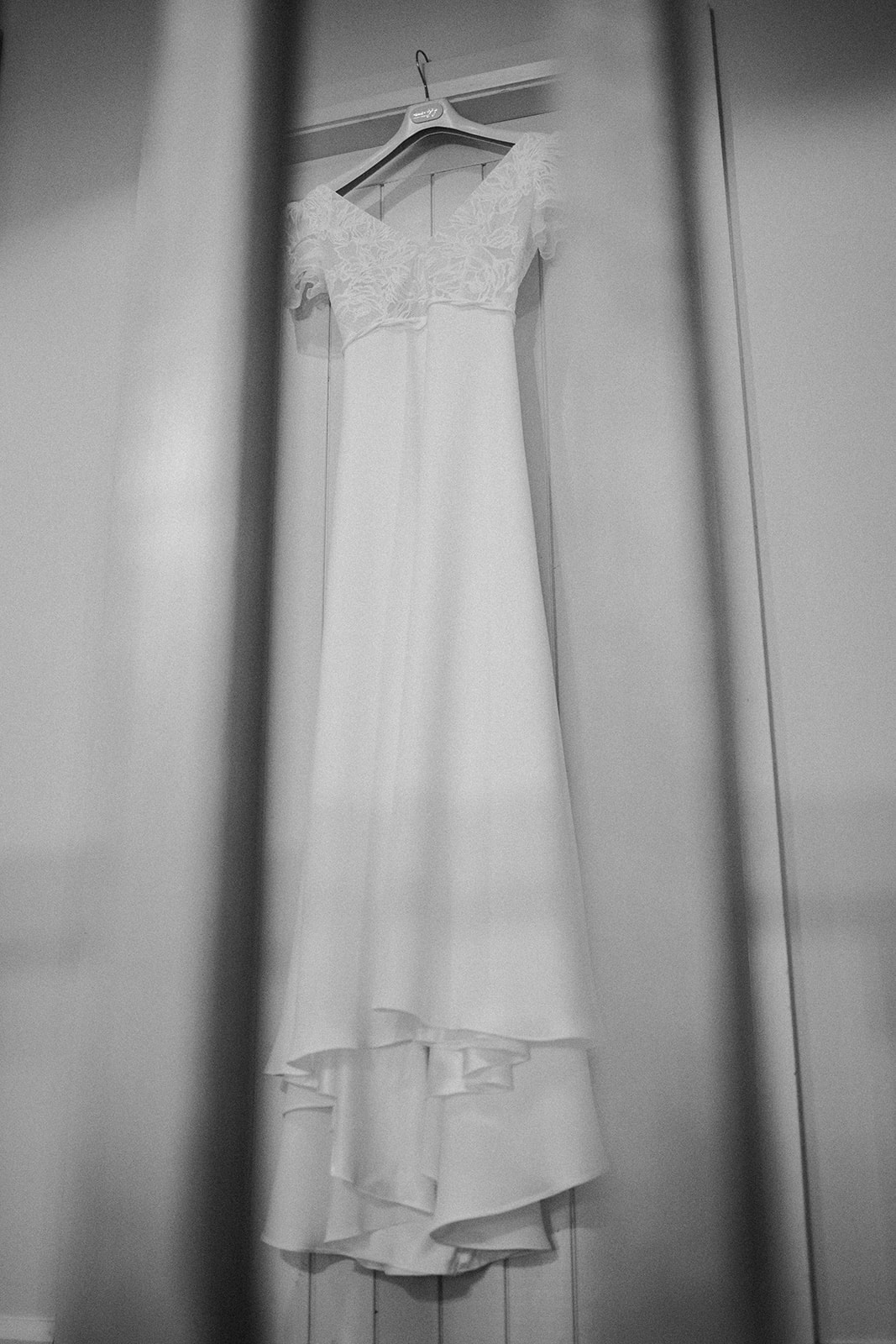 Bride’s wedding dress hanging up ready for the ceremony at Ashes Barns.