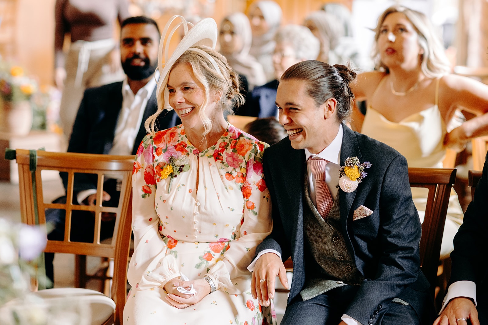 Guests sat in the stone barn during the ceremony at Ashes Barns.