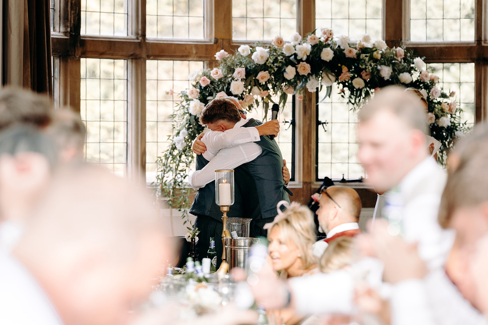 Emotional hug during the wedding speeches at Thornbridge Hall.