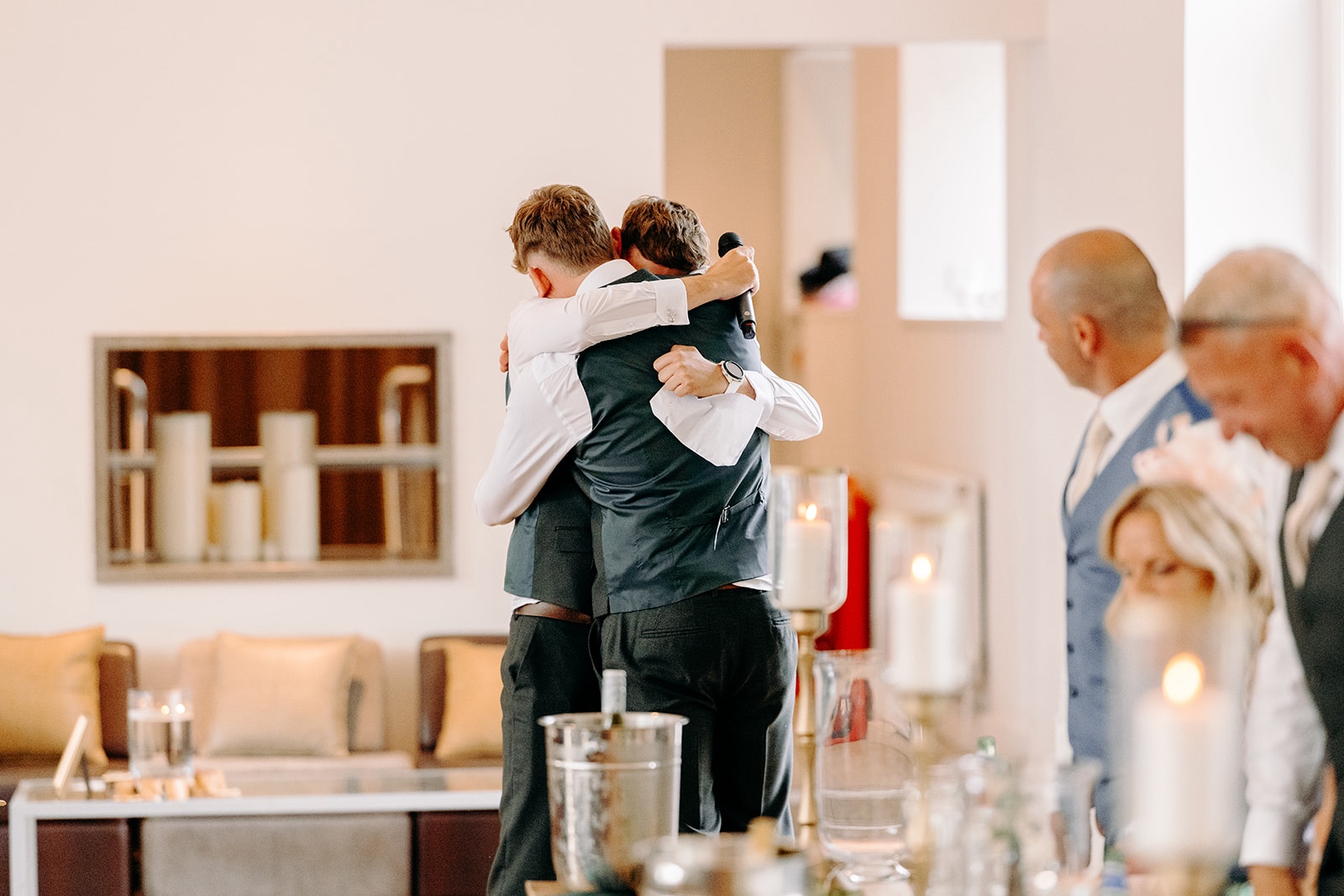 Emotional hug during the wedding speeches at Thornbridge Hall.