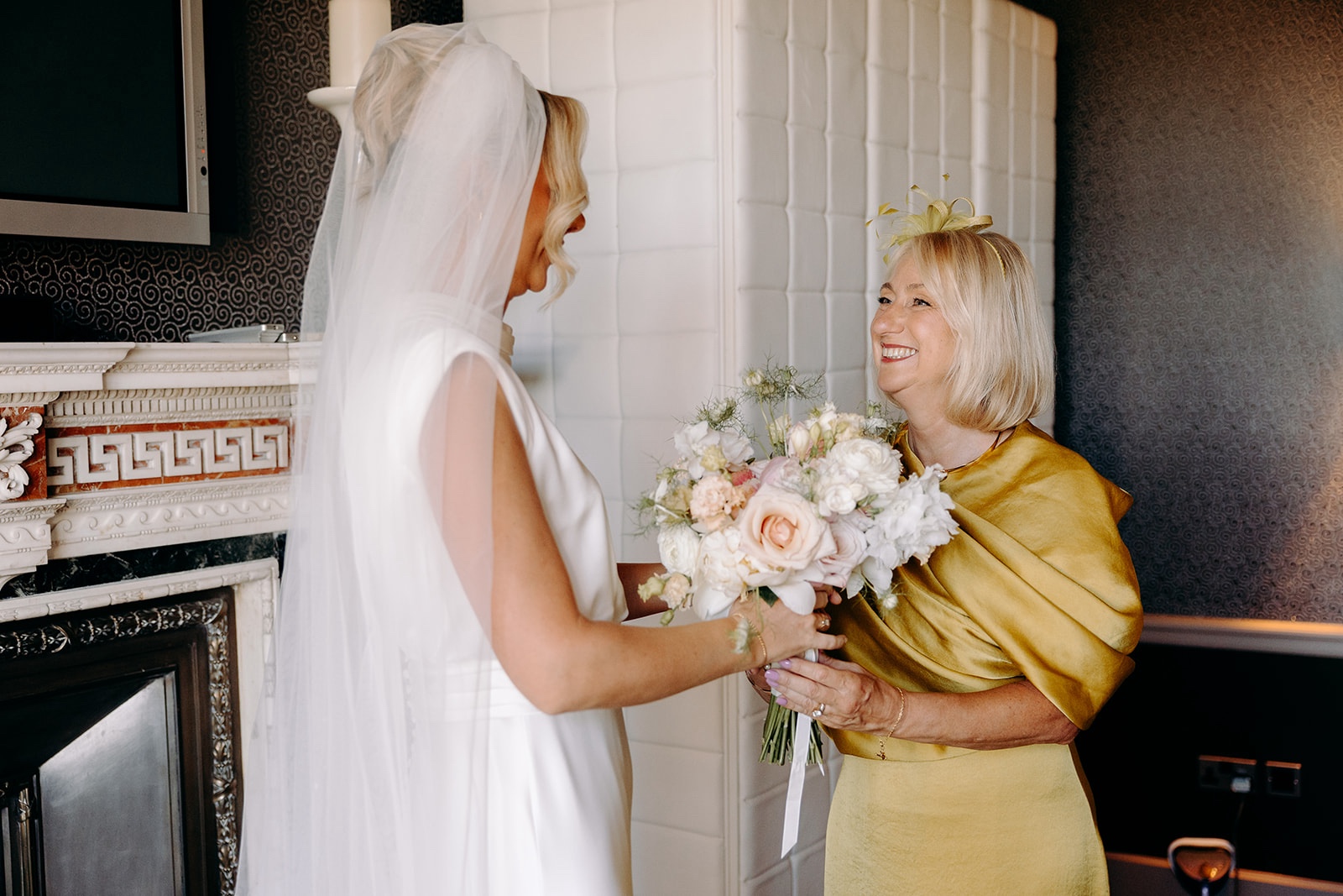 Quiet moment between the bride and her mum before the Thornbridge Hall wedding ceremony.