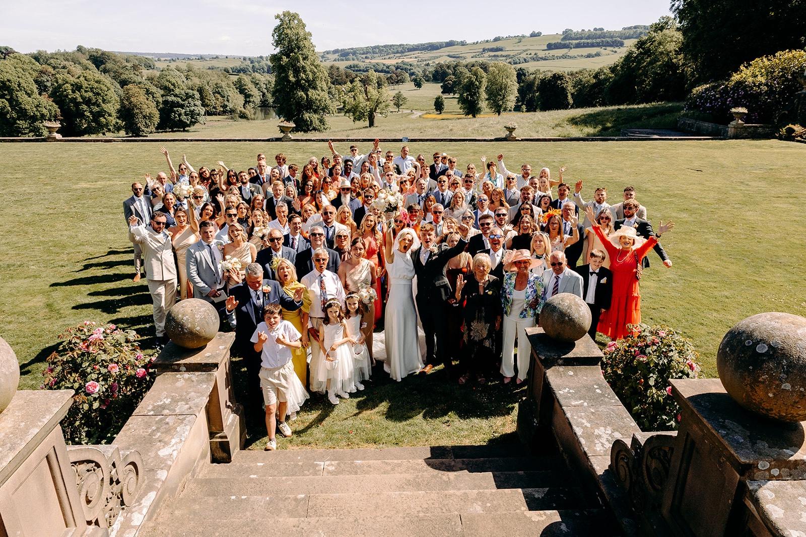 Large wedding group photograph outside Thornbridge Hall in Derbyshire.